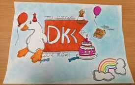 Na stronie kartka z logo DKK