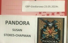 Plakat DKK z okładką książki "Pandora".
