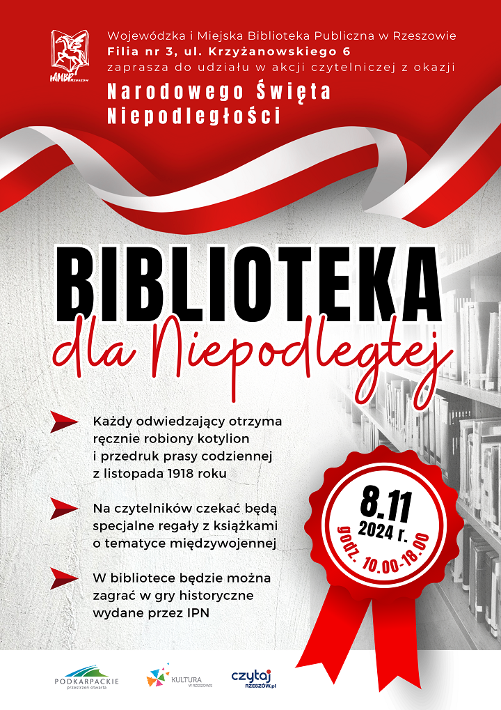 W tle regał biblioteczny z książkami. Na pierwszym planie kotylion z barwami Polski oraz wstęga w kolorze biało czerwonym. 