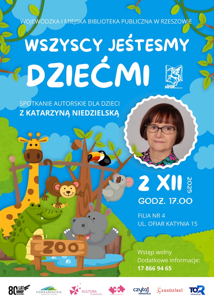 Zwierzęta w zoo. Powyżej kobieta w kolorowej bluzce i okularach