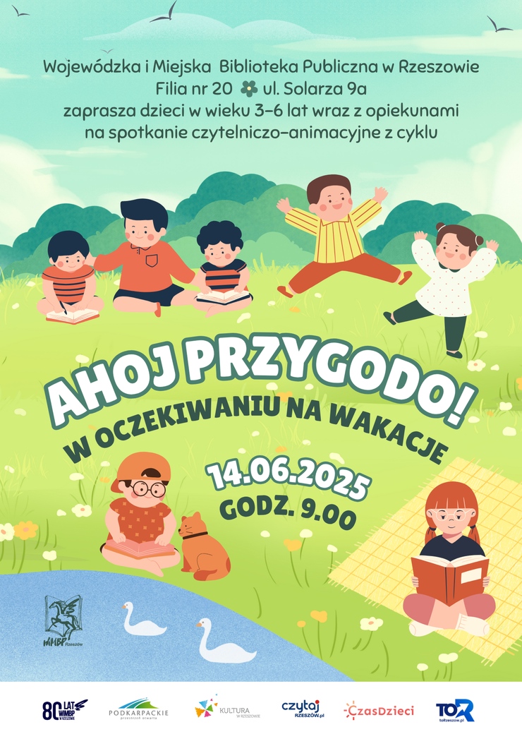 Na trawie grupa dzieci czytających i bawiących się