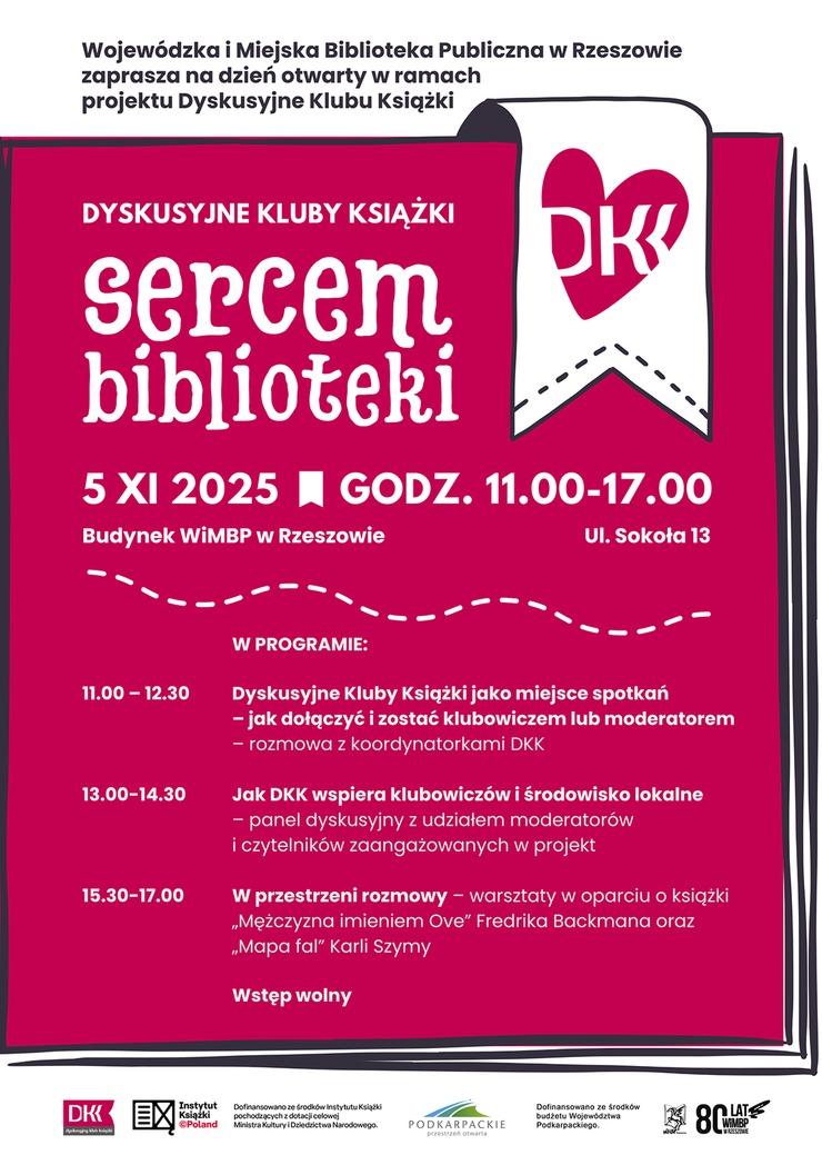 Różowa książka z zakładką z sercem.