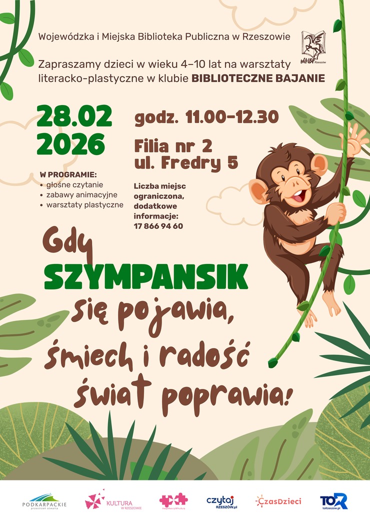 Małpa wspinająca się po lianie