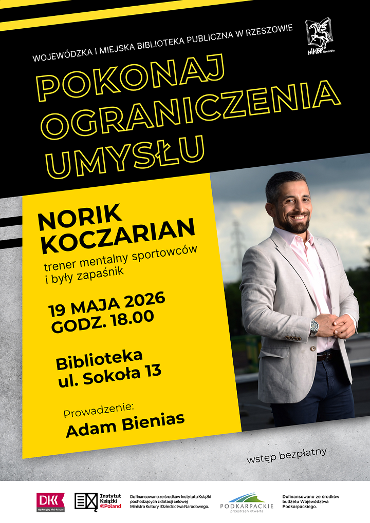 Plakat ze zdjęciem młodego, uśmiechniętego mężczyzny w&nbsp;marynarce i&nbsp;dżinsach