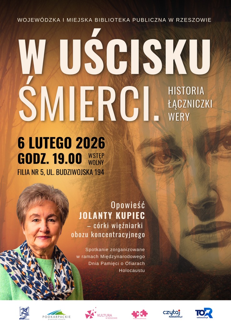 Kobieta z&nbsp;kr&oacute;tkimi włosami, zielonym swetrze i&nbsp;apaszką. W tle twarz kobiety.